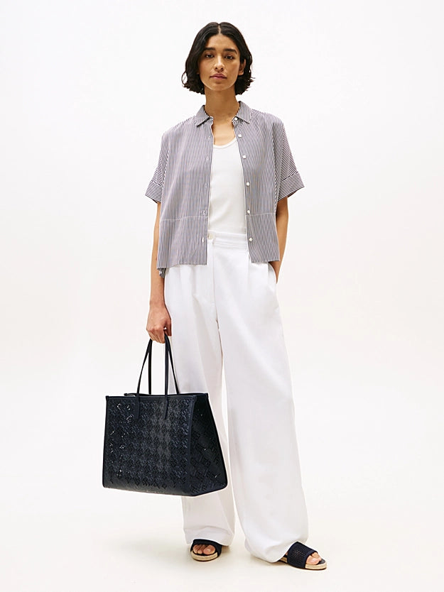 Borsa Tote City blu con monogrammi traforati TH