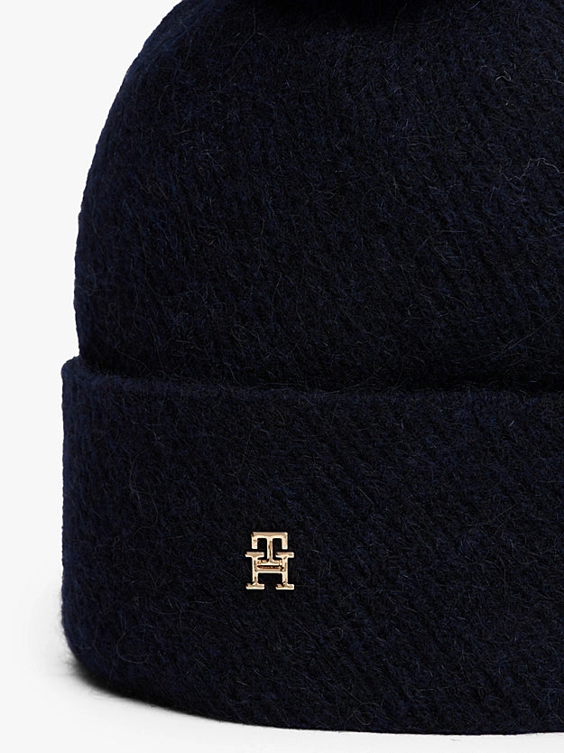 Cappelli Chic in maglia blu o nero con pompon