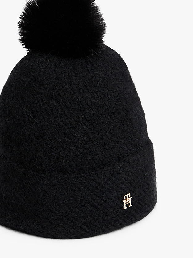 Cappelli Chic in maglia blu o nero con pompon