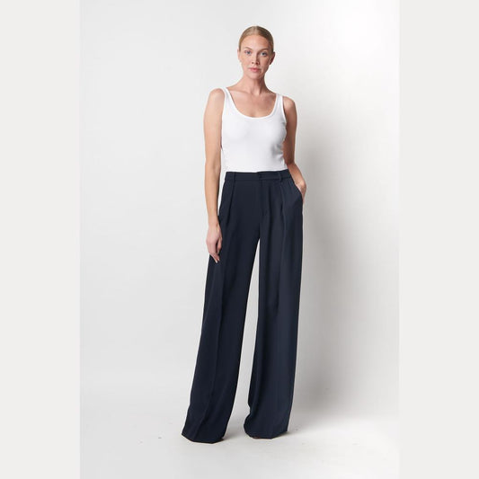 Pantaloni blu a gamba larga in triplo georgette