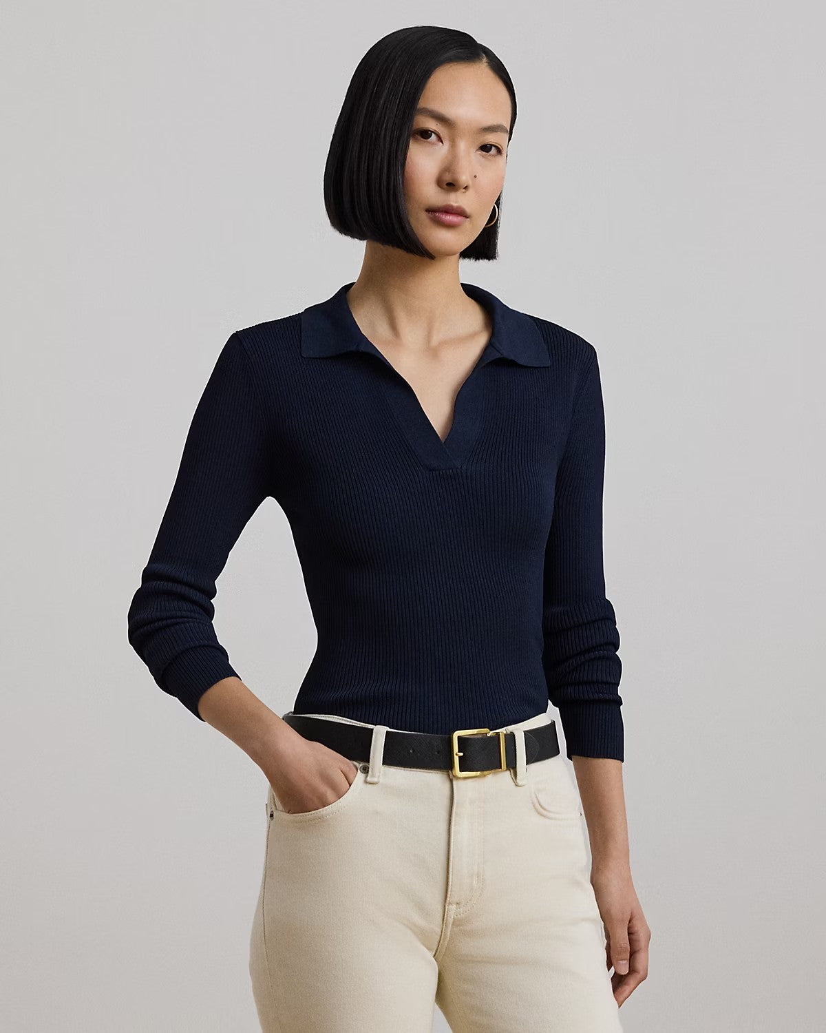 Maglia a polo blu con lavorazione a costine