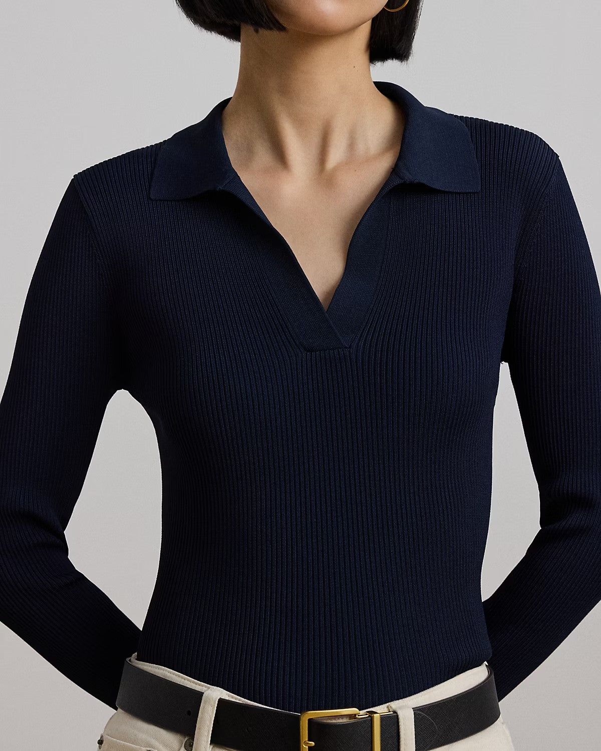 Maglia a polo blu con lavorazione a costine