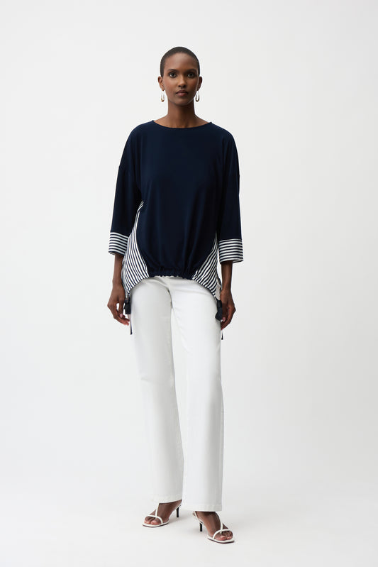 Blusa fluida a contrasto con motivo a righe