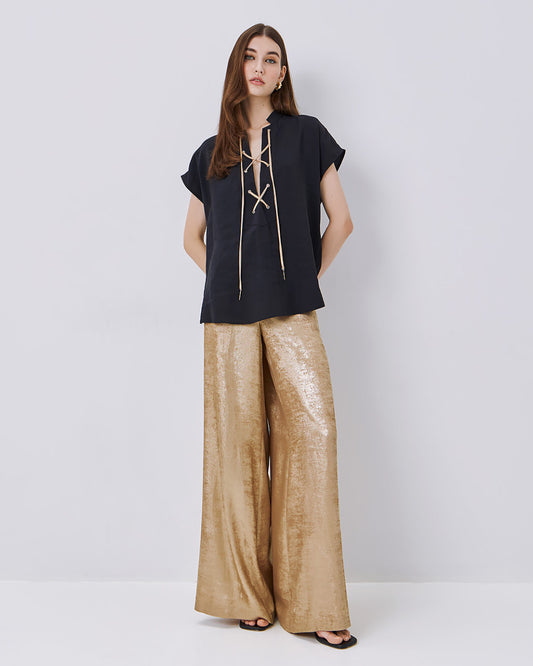 Pantaloni effetto oro metallizzato