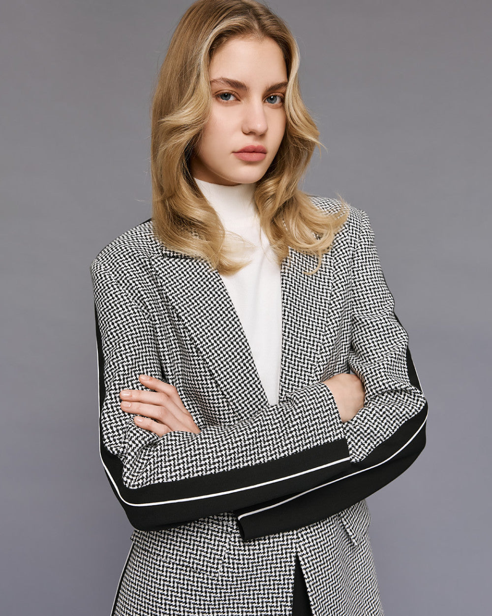 Giacca a Blazer pied-de-poule con dettagli piping