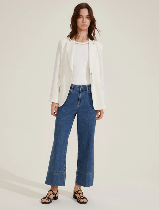 Jeans a trombetta con orlo impunturato