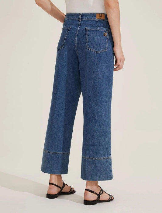 Jeans a trombetta con orlo impunturato
