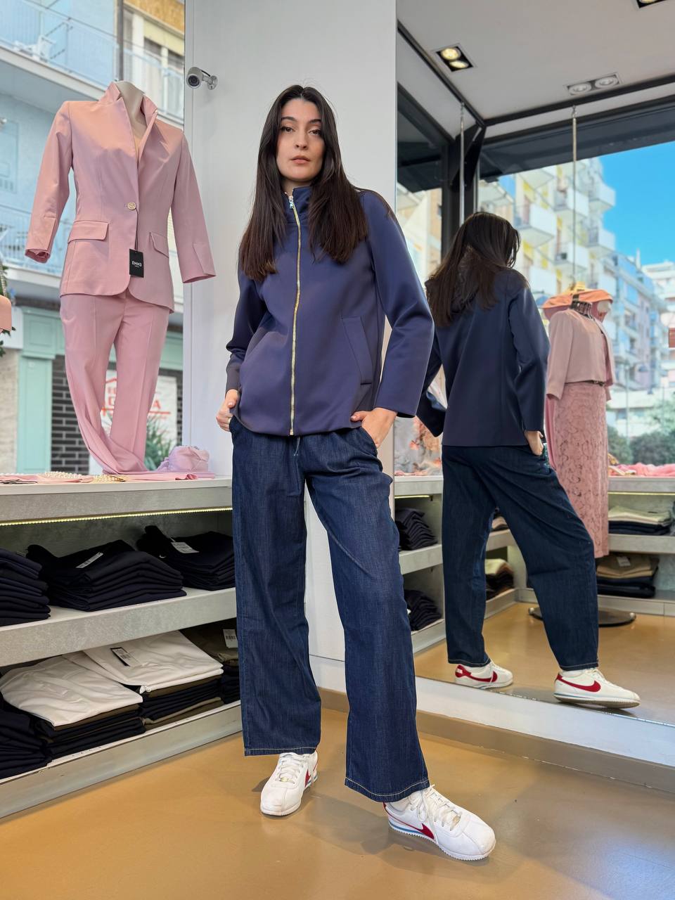Giacca blu in tessuto tecnico con cappuccio staccabile