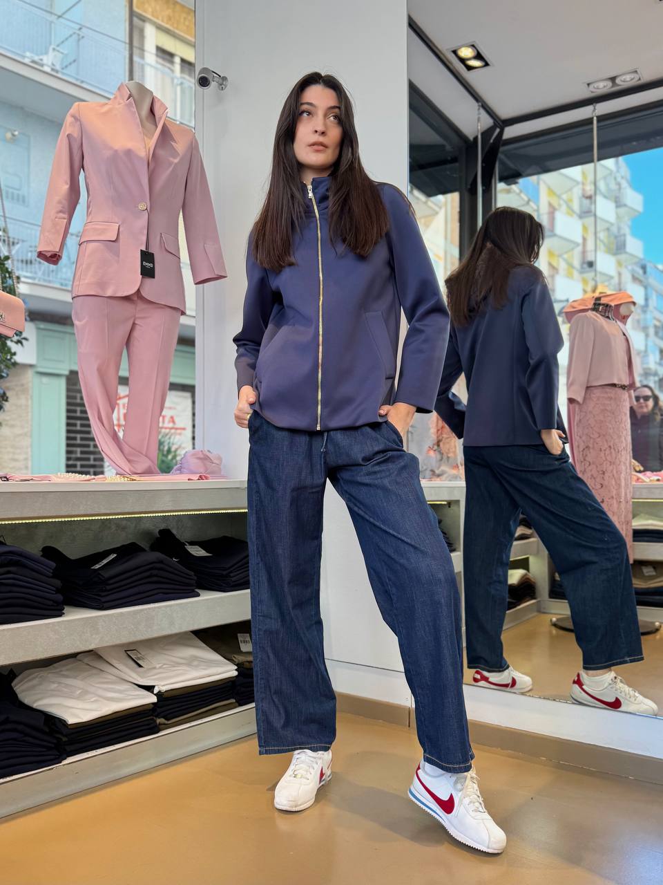 Giacca blu in tessuto tecnico con cappuccio staccabile