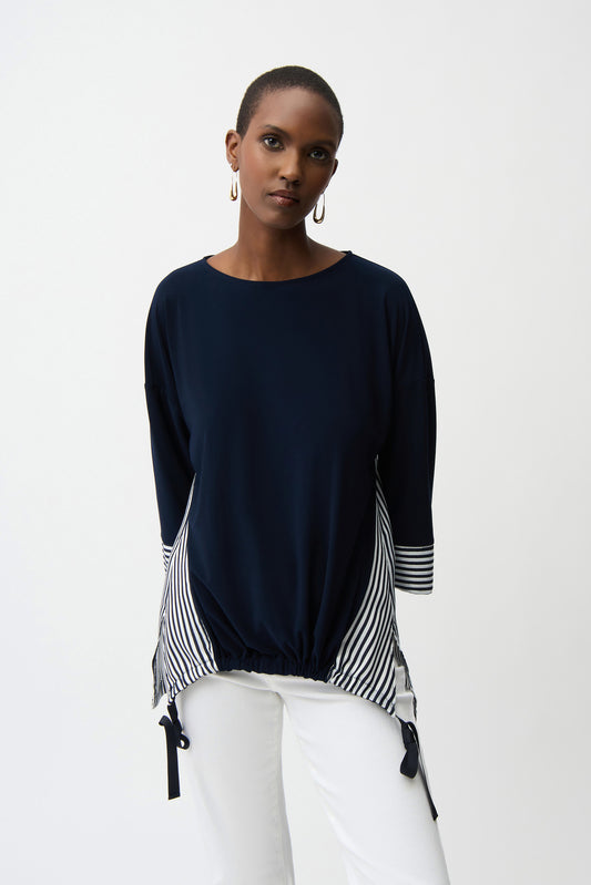 Blusa fluida a contrasto con motivo a righe