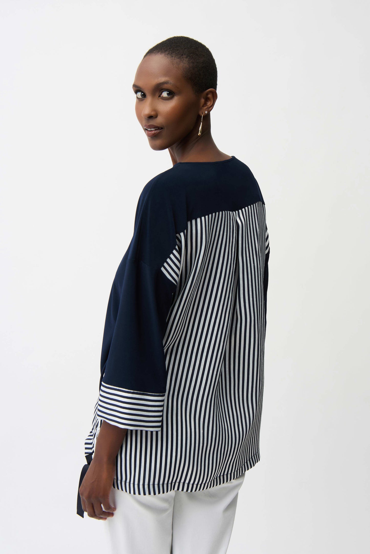 Blusa fluida a contrasto con motivo a righe
