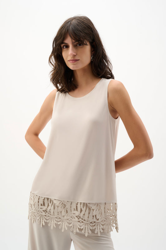 Top in jersey seta con orlo in pizzo