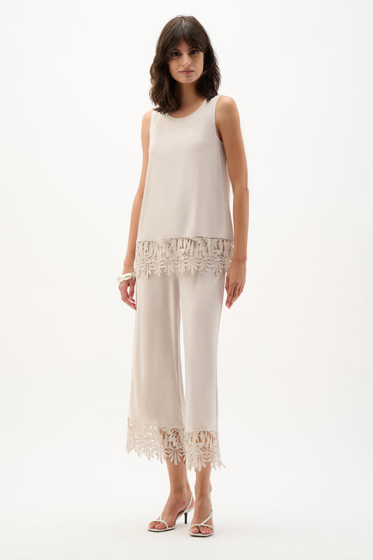 Top in jersey seta con orlo in pizzo