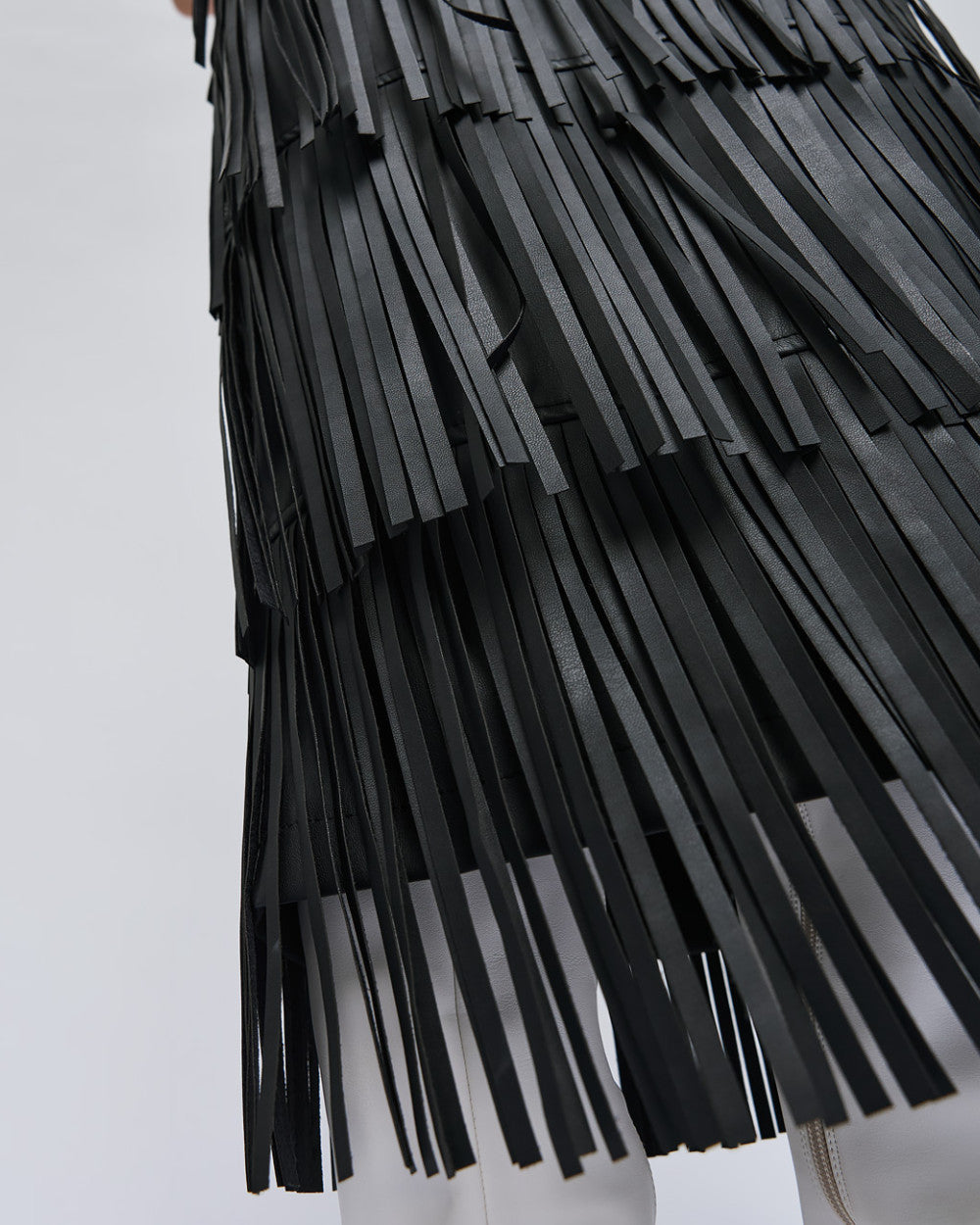 Gonna midi in similpelle con frange