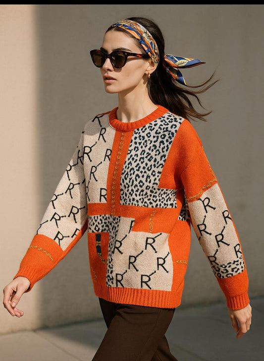 🎨 Maglia Patchwork con Stampa Animalier e Dettagli Catena